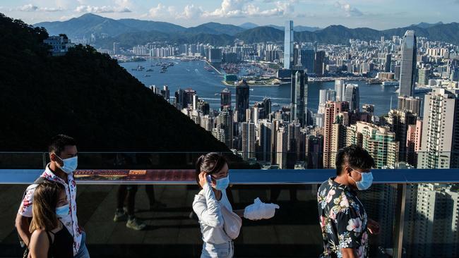 Travellers visit the popular Victoria Peak in Hong Kong. Picture: Anthony Wallace / AFP