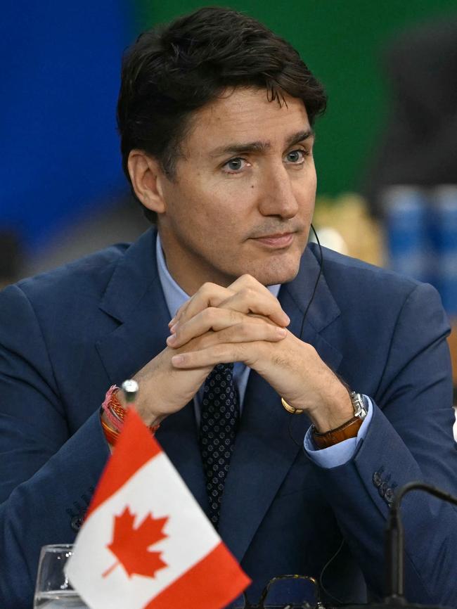 As violent protests broke out in Montreal, Justin Trudeau was filmed dancing at a Taylor Swift concert in Toronto. Picture: AFP