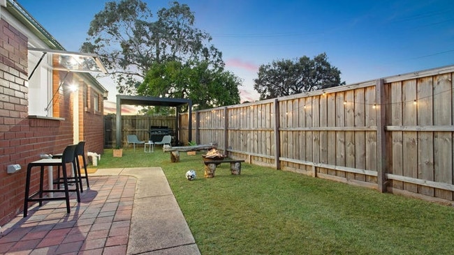 The pair added the pergola and festoon lighting to the home’s rear yard after moving in.