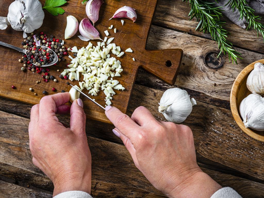 Foods such as garlic, onions, spices and foods high in sulphur-containing compounds can impart distinct odours to bodily secretions. Picture: iStock