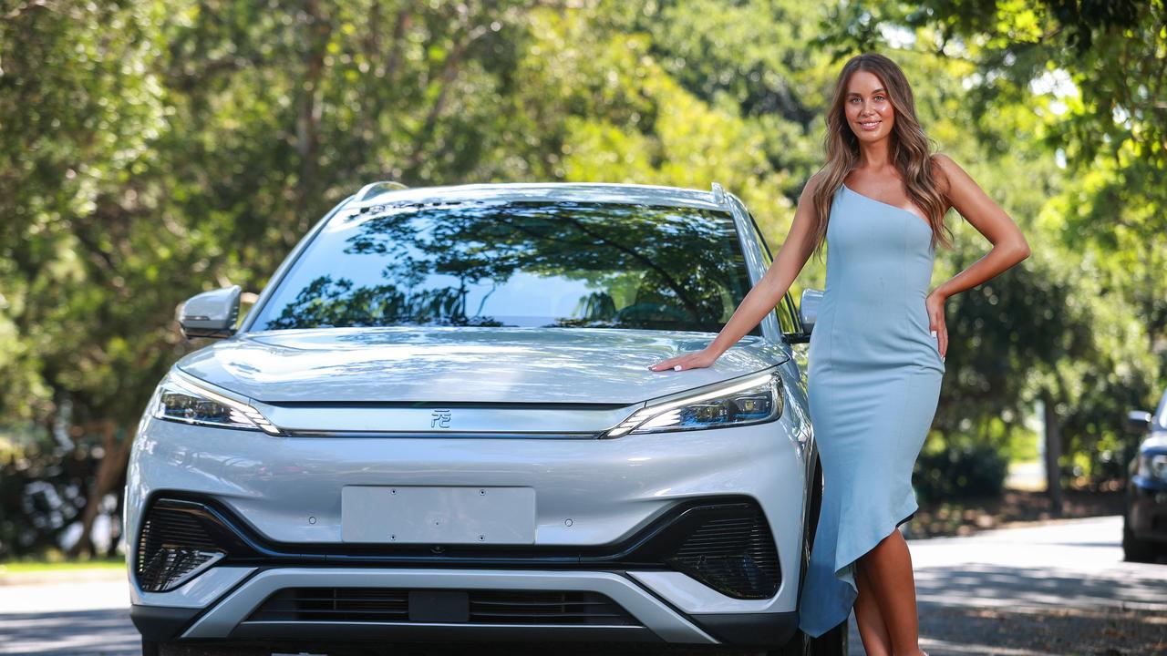 Esma Voloder, Former Miss World Australia with a BYD electric hatchback. It is likely to be the first sub $30,000 electric vehicle for sale in Australia. Picture: Justin Lloyd.