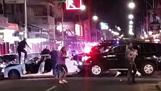 Scenes from the car chase and shooting last night in Hindley St. Picture: Nine News