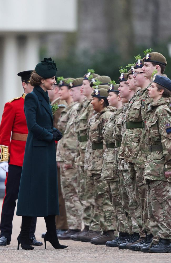 She was pictured meeting with junior cadets from Northern Ireland. Picture: Adrian Dennis/AFP