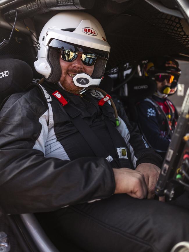 News Corp Australia's David McCowen with Ford's Dakar Rally Raptor. Photo: Supplied