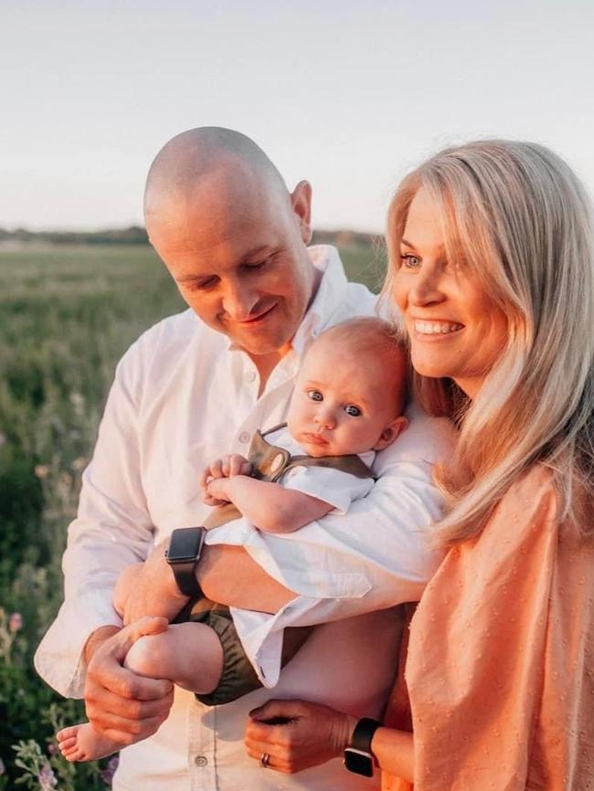 Joel and Erin with their son Hudson.