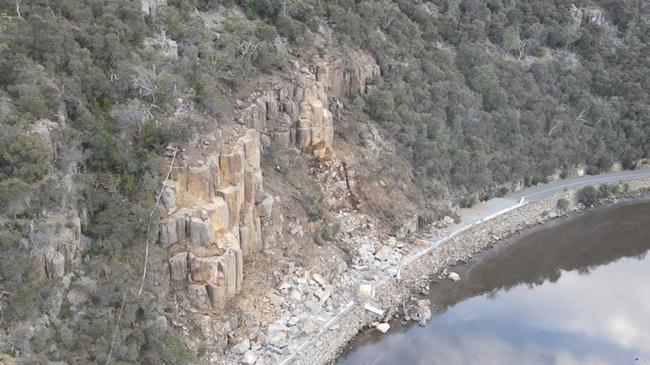 The Tasman Highway near Orford still looks like a mess after boulders were removed from the cliff face. Photo: Shannon Wells / Twitter.