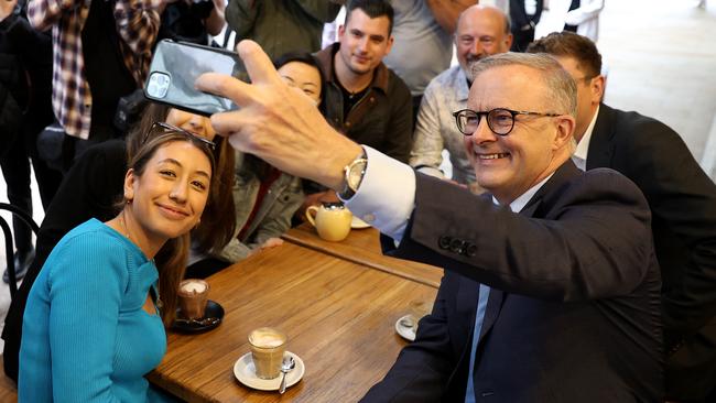 Anthony Albanese poses for a selfie with some locals in Sydney on Thursday hours before announcing he had Covid. Picture: Toby Zerna