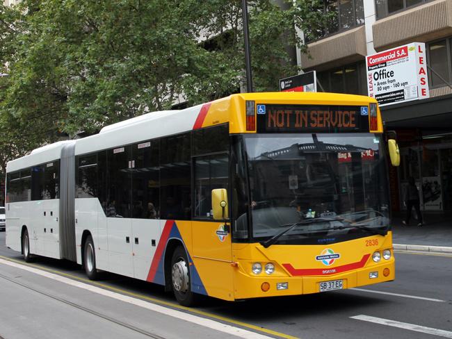 Public transport - Adelaide Metro bus during a ''dead running'' or Ghost run through King William Street, Adelaide. Buses running with a 'not in service' sign are usually travelling between routes.