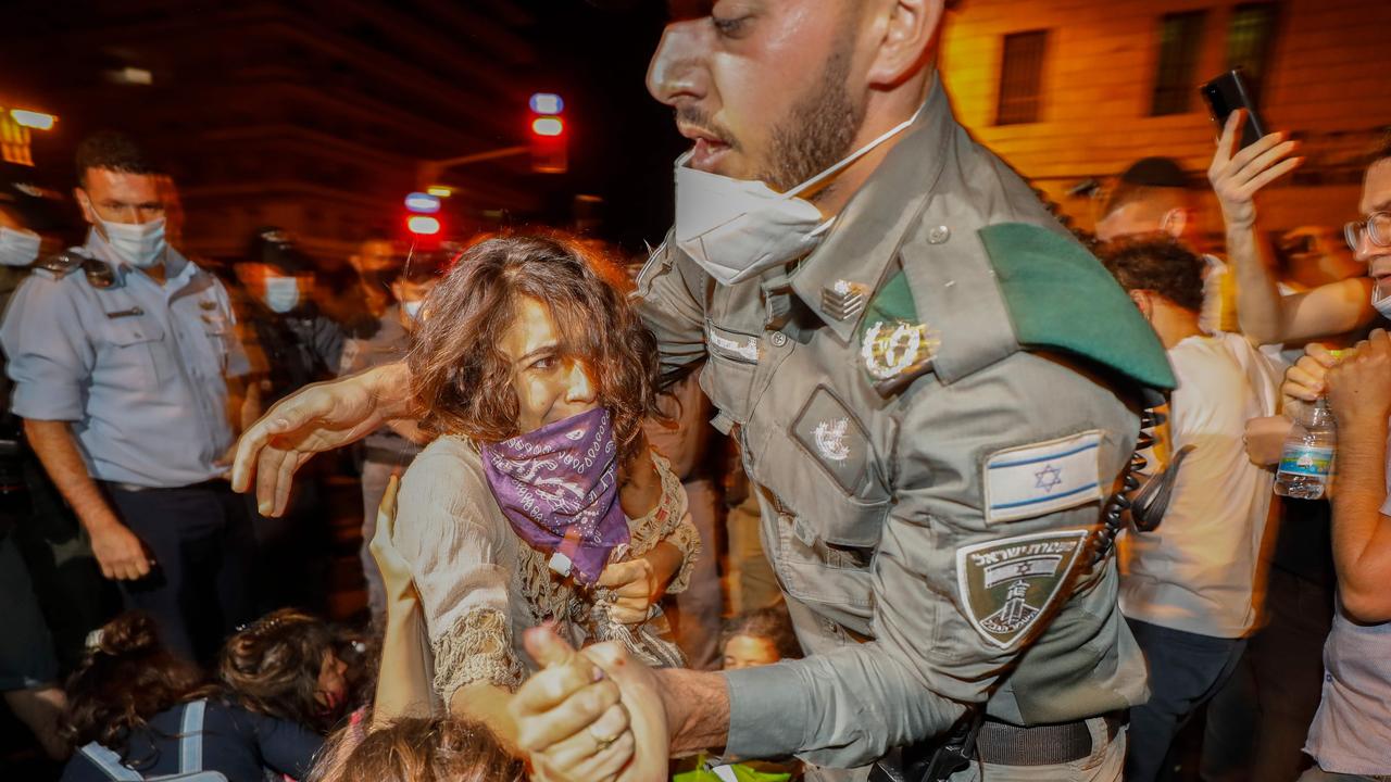 Thousands protested against Prime Minister Benjamin Netanyahu across Israel on Saturday night, demanding he resign over a resurgence of coronavirus cases. Picture: Menahem Kahana/AFP