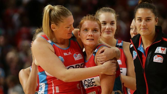 NSW Caitlin Thwaites hugs fellow shooter Stephanie Wood after the Swifts beat the Firebirds earlier this year. Pic Brett Costello