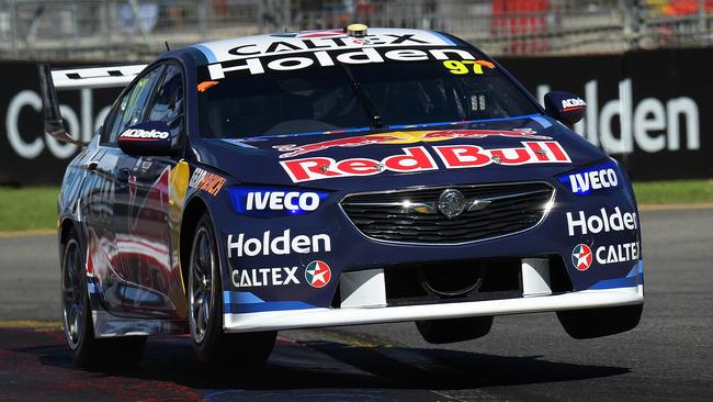 Shane van Gisbergen leaping over the kerb during Race 1 qualifying.