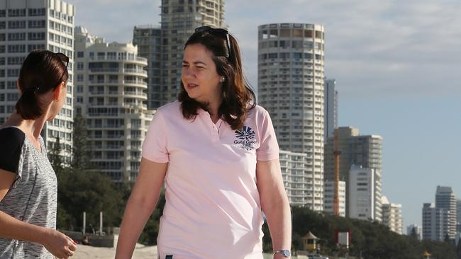 Attorney-General Yvette D'Ath and Premier Annastacia Palaszczuk walk along Surfers Paradise beach. Picture Glenn Hampson