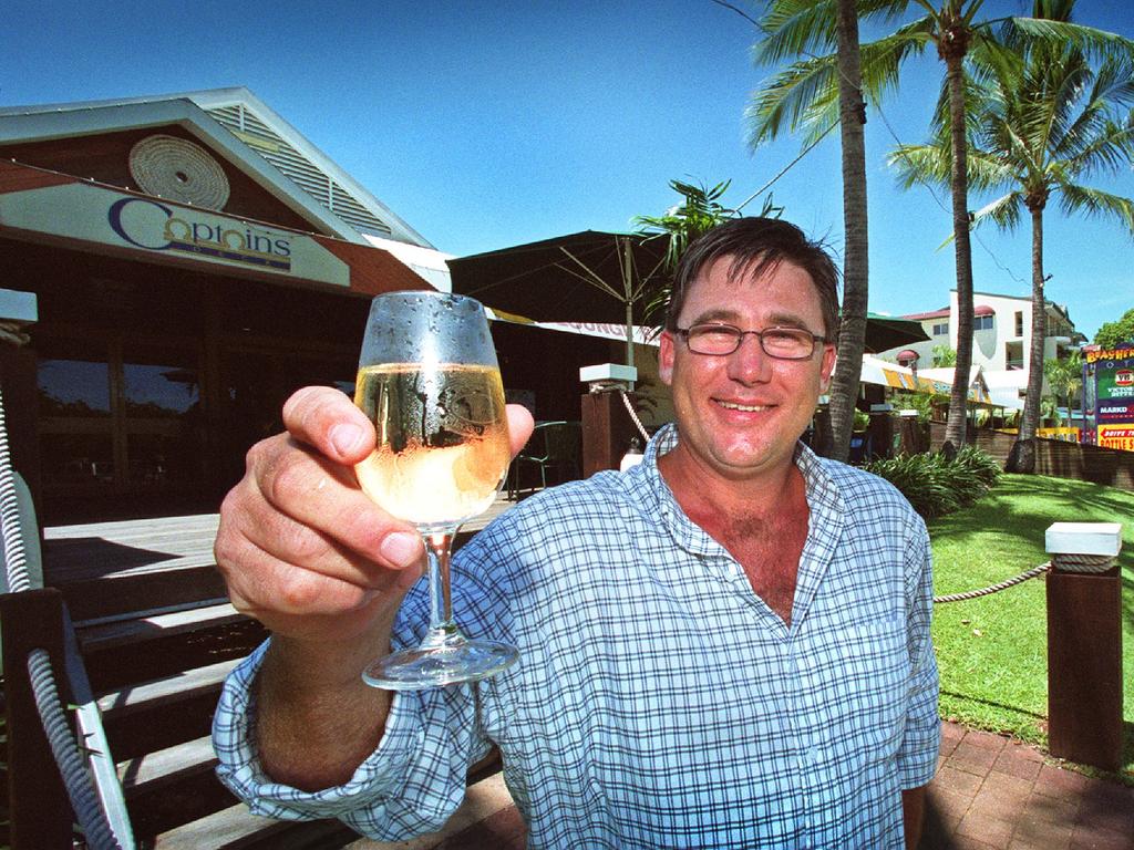 Happier times: Doug Sallis outside the Beachfront Hotel in 2002.