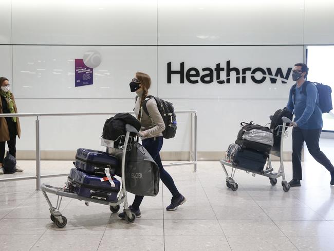 Travellers arrive at Heathrow airport in London, England. The UK government has lifted most travel restrictions. Picture: Getty Images