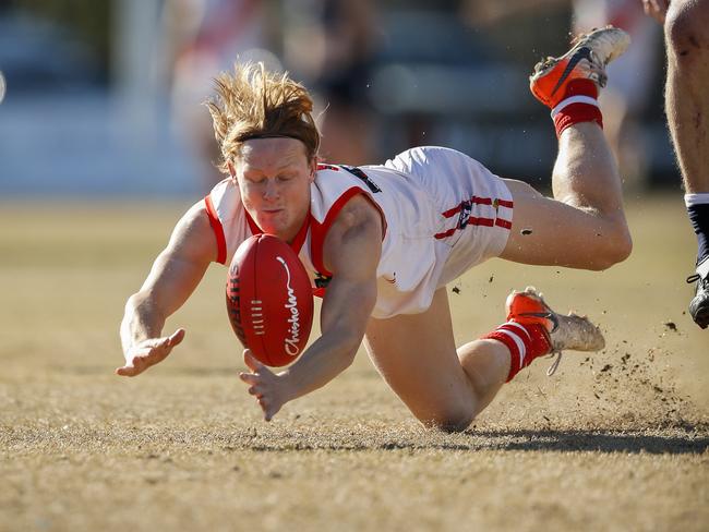 Sorrento’s Mitch Dunn hits the deck against Edi-Asp on Saturday. Picture: Valeriu Campan