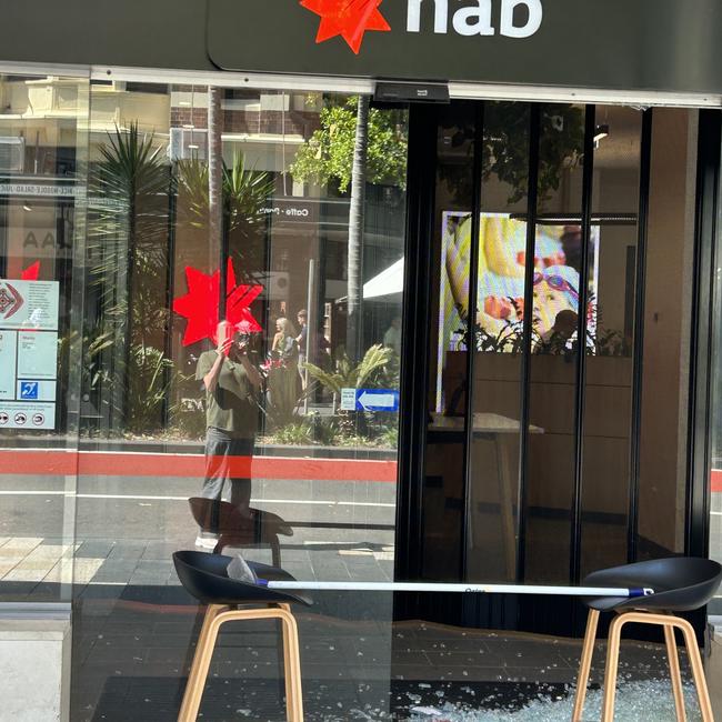 Damage to the NAB bank branch on The Corso, Manly, allegedly caused by a man armed with a hammer on a vandalism rampage early on Monday, October 30, 2023. Picture: Steve Howard