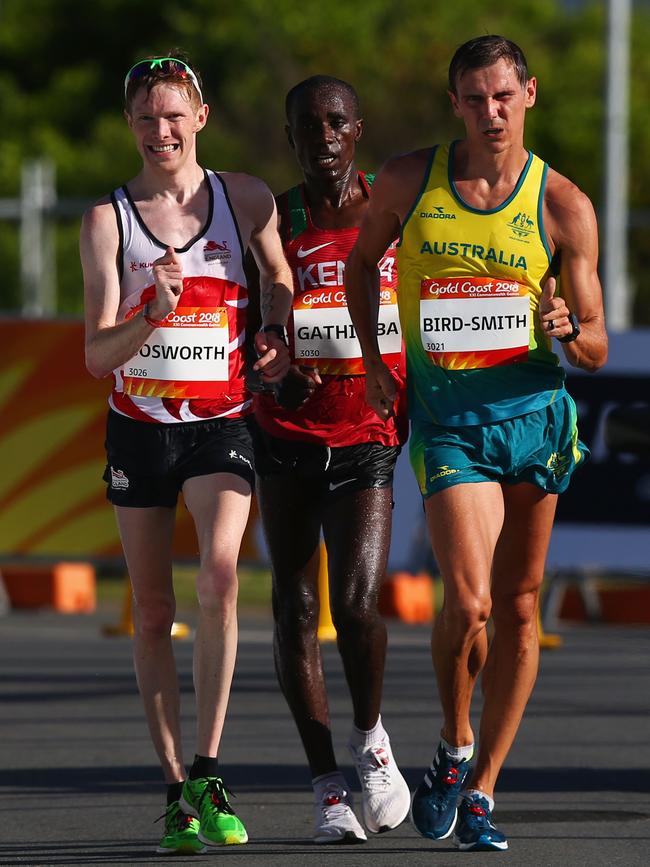 Dane Bird-Smith (right) on his way to gold in the men’s 20km walk