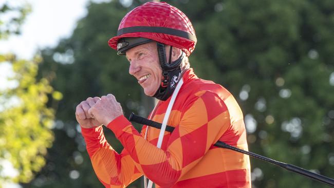 Jim Byrne returns after winning the Weetwood Handicap at Toowoomba aboard Apache Chase. Picture: Nev Madsen.