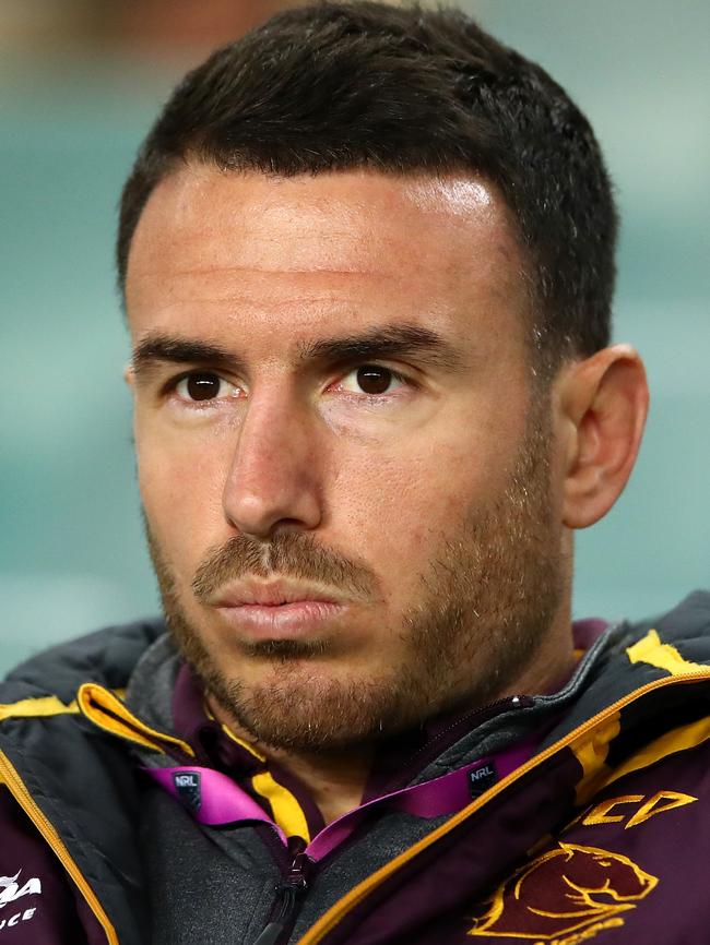 Darius Boyd watches on from the stands.