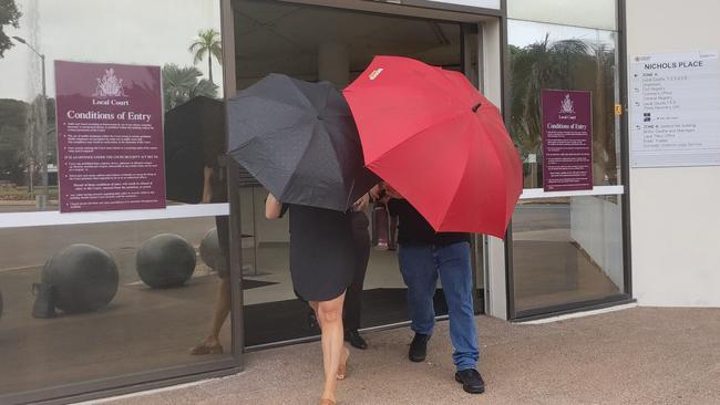 LJ Hooker Home Loans accountant Melissa Prentos leaves Darwin Local Court shielded by supporters after the 44-year-old pleaded guilty to multiple assaults on police and security guards at Mindil Beach Casino. Picture: Zizi Averill