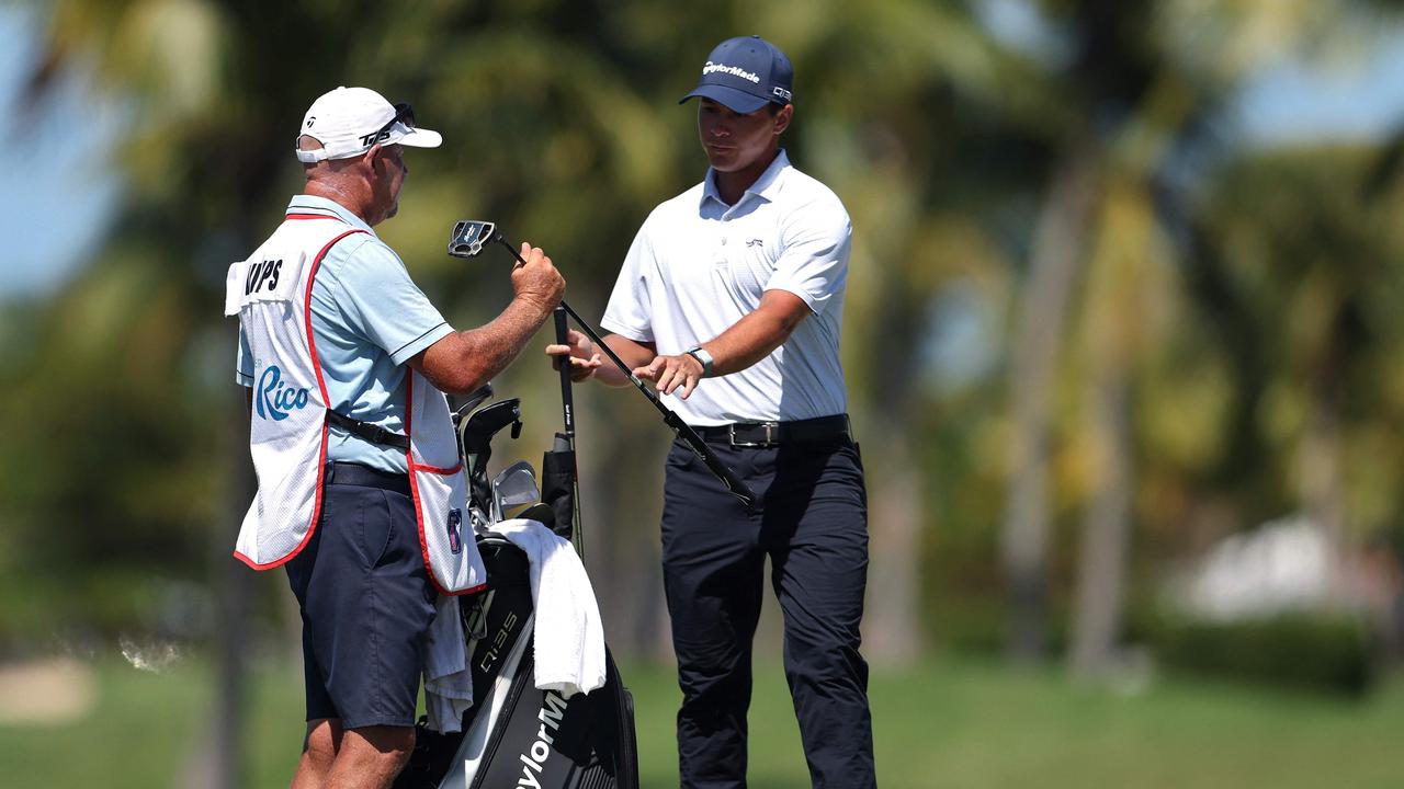 Vilips with his caddie, Tim Butler. Picture: Emilee Chinn / Getty Images North America / Getty Images via AFP