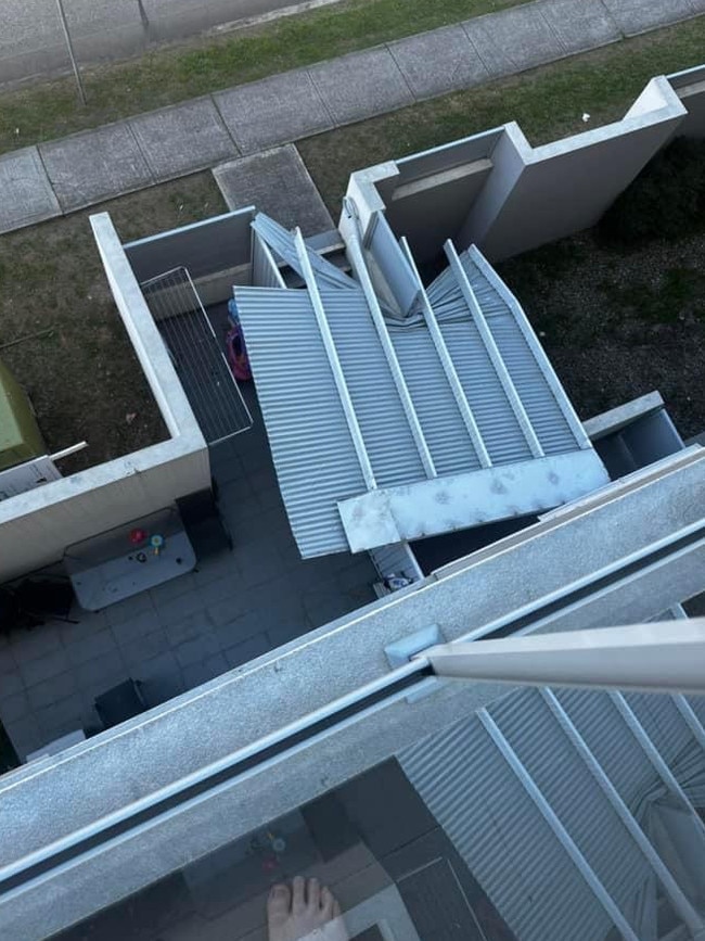 Roof coming off an apartment block at the corner of Chamberlain and Moore St in Campbelltown