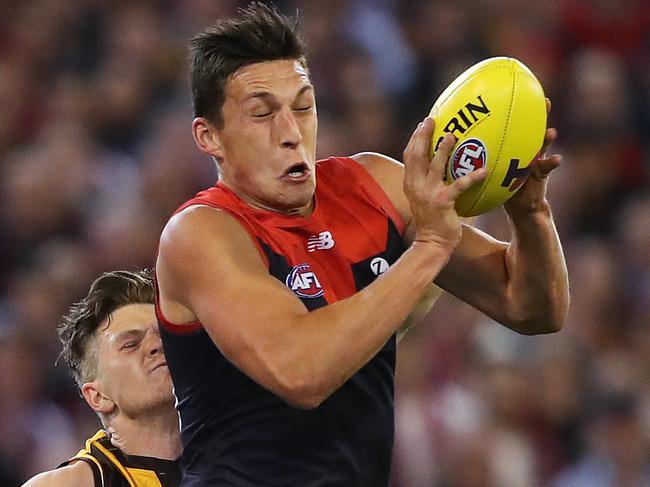 Melbourne's Sam Weideman marks in front of Hawthorn's Taylor Duryea during the AFL semi final match between the Melbourne Demons and Hawthorn at the MCG. Picture. Phil Hillyard