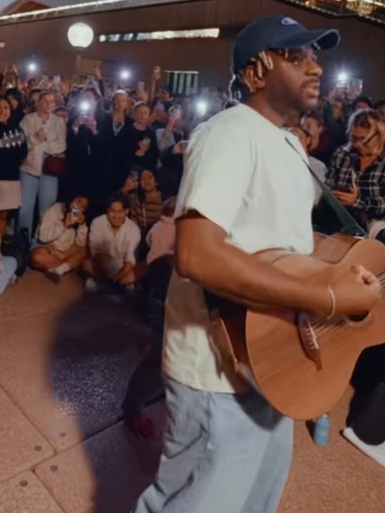 Musician Myles Smith performing an impromptu acoustic set on the Opera House forecourt - not Pitt St. Picture: Instagram