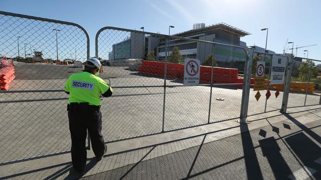 Security at the new Royal Adelaide Hospital construction site, where Steve Wyatt was killed on Saturday in a workplace accident. Pic: Tait Schmaal