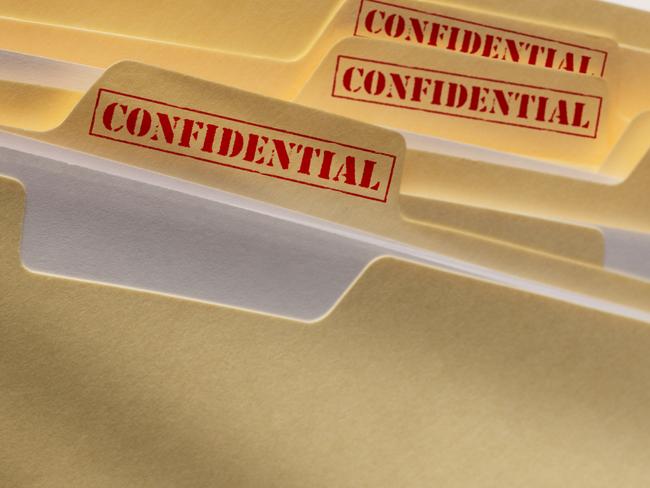 A stack of confidential files.