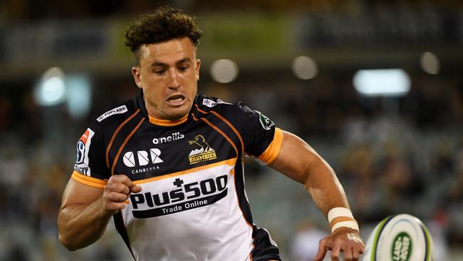 Tom Banks chases the ball for the Brumbies. Picture: Tracey Nearmy/Getty Images