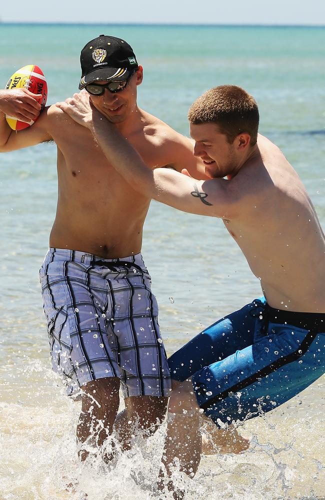 Chris Venn and Dean Jones of East Bentleigh battle for the ball at Rye beach on December 31, 2012. Picture: Hamish Blair