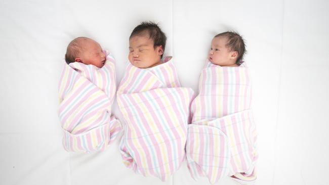 James Dean Butler, Bernadette Pameti and Alyssa Reed. For the first time, more babies have been born at Campbelltown Hospital than Liverpool Hospital. Picture: Melvyn Knipe