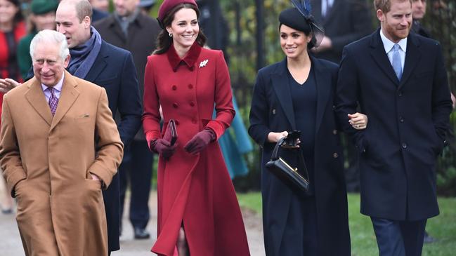 Charles chiming in with the tan coat. Picture: AFP 