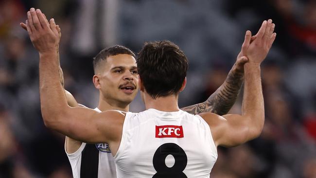 MELBOURNE, AUSTRALIA – AUGUST 23: Bobby Hill of the Magpies celebrates a goal during the round 24 AFL match between Melbourne Demons and Collingwood Magpies at Melbourne Cricket Ground, on August 23, 2024, in Melbourne, Australia. (Photo by Darrian Traynor/Getty Images)