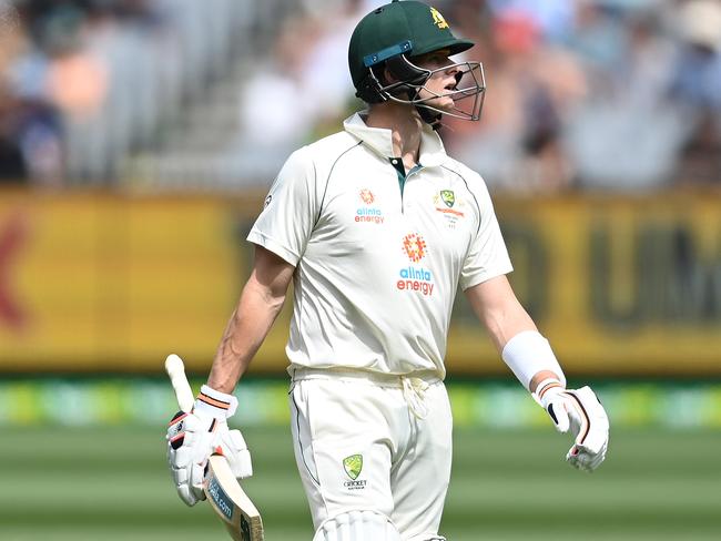 MELBOURNE, AUSTRALIA - DECEMBER 28: Steve Smith of Australia walks off the field after being dismissed by Jasprit Bumrah of India during day three of the Second Test match between Australia and India at Melbourne Cricket Ground on December 28, 2020 in Melbourne, Australia. (Photo by Quinn Rooney/Getty Images)