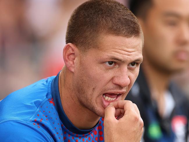 SYDNEY, AUSTRALIA - MARCH 12: Kalyn Ponga of the Knights watches from the bench during the round two NRL match between Wests Tigers and Newcastle Knights at Leichhardt Oval on March 12, 2023 in Sydney, Australia. (Photo by Cameron Spencer/Getty Images)