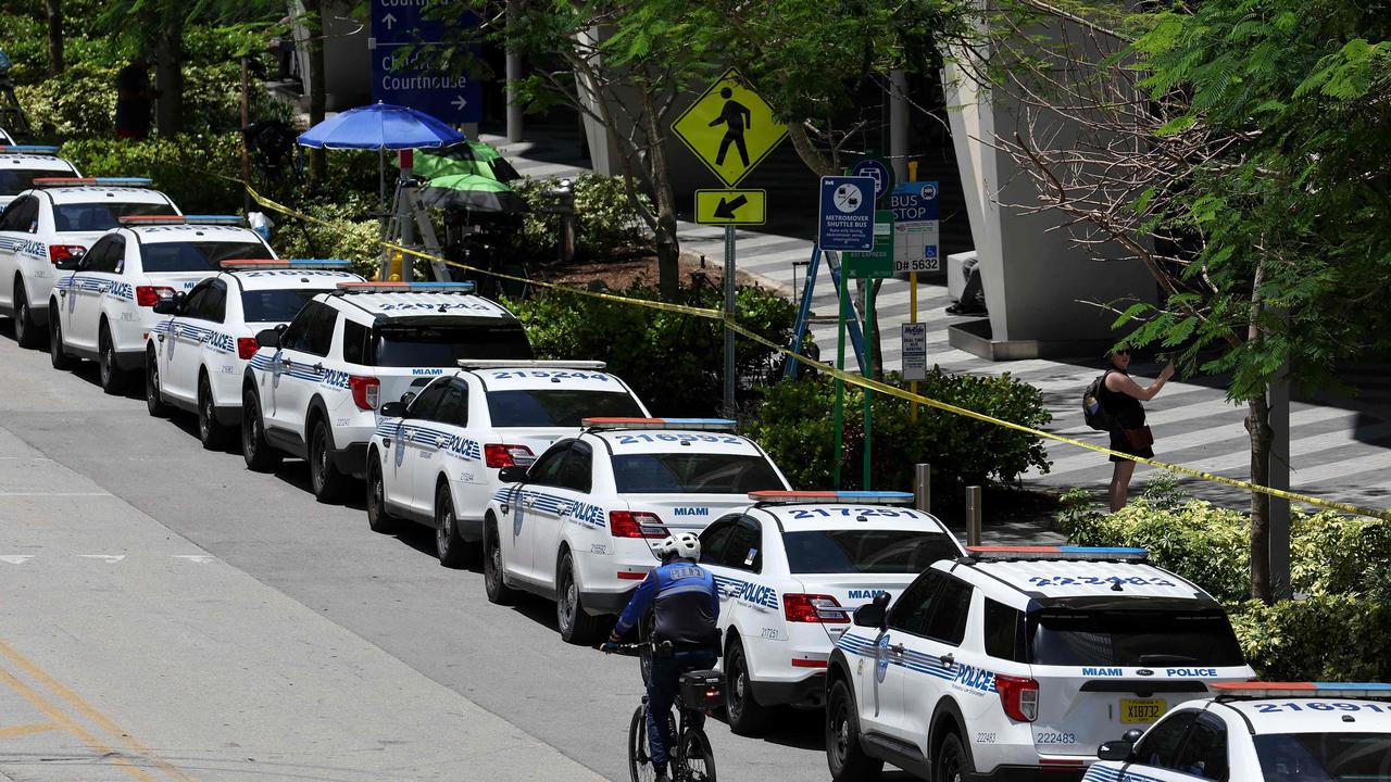 Police cars nose to tail outside the courthouse. (Photo by SCOTT OLSON / GETTY IMAGES NORTH AMERICA / Getty Images via AFP)