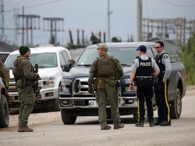 Heavily armed tactical police search for Bryer Schmegelsky and Kam McLeod in the town of Gillam. Picture: Clint Brewer/ NEWS360