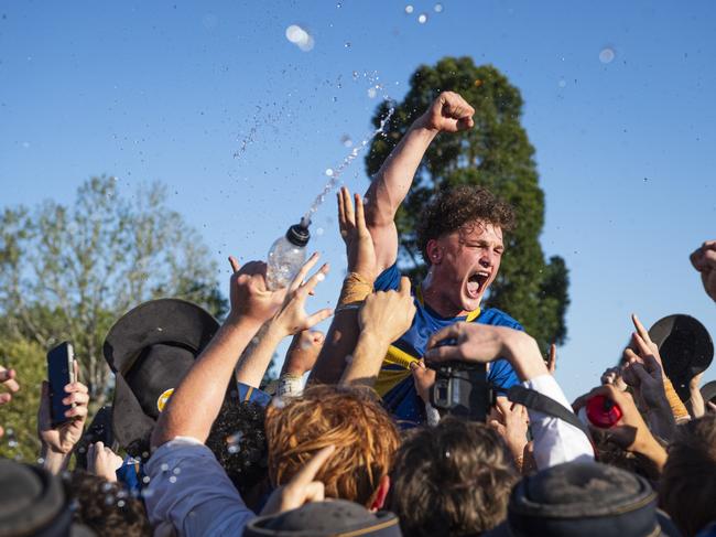 Grammar First XV captain Joe Gray is lifted in celebration of winning the O'Callaghan Cup on Grammar Downlands Day hosted by Downlands College, Saturday, August 31, 2024. Picture: Kevin Farmer