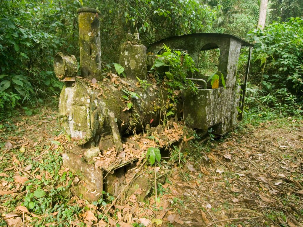 Ruins of the Espiritu Santo (Holy Ghost) Gold Mine mining locomotive in the jungle. Picture: Alamy