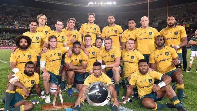 The Wallabies pose with the Nelson Mandela Challenge Plate after consecutive draws.
