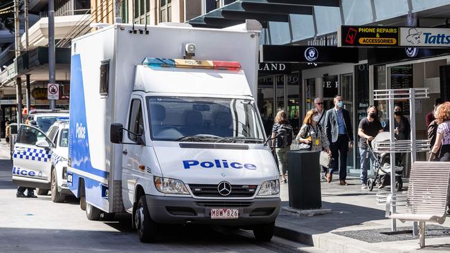 A police van on Elizabeth St. Picture: Jake Nowakowski