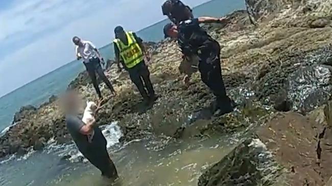 A 39-year-old Trinity Beach man ran into the ocean with his pet French bulldog after absconding from a stolen car at Ellis Beach on Sunday. Picture: QPS