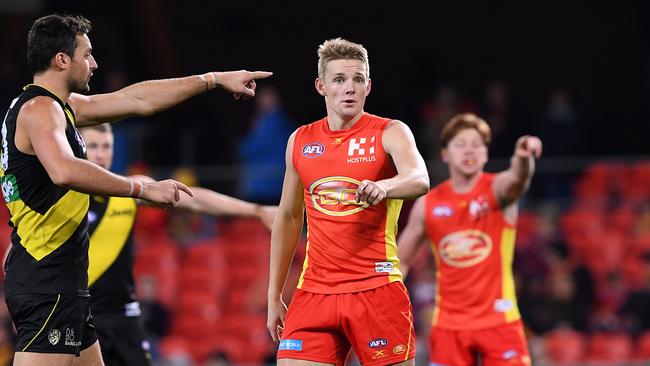 Max Spencer looks on during the Round 19 AFL match between the Gold Coast Suns and the Richmond Tigers at Metricon Stadium on the Gold Coast, Saturday, July 29, 2017. Picture: AAP Image, Dave Hunt.