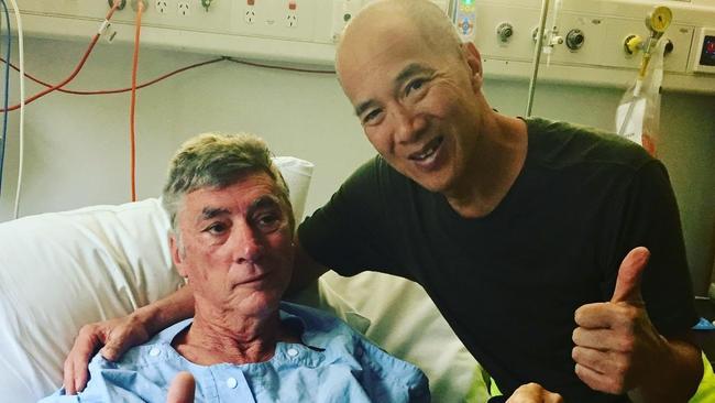 Sydney surgeon Charlie Teo with Logan’s Gary Ralph after the brain surgery.