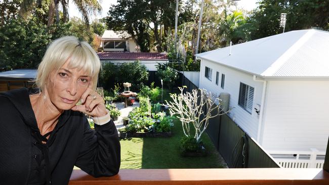 Annette Spanski said the “enormous” granny flat constructed next door has cost her and her partner their privacy, and could be a sign of the death of Queensland backyards. Picture: Glenn Hampson