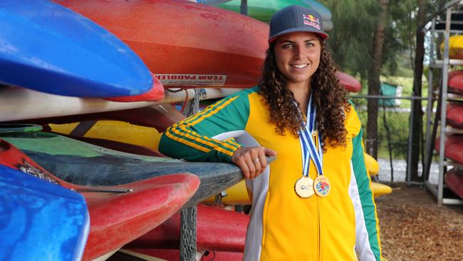 Golden girl Jessica Fox returns home after her historic double at the world championships.