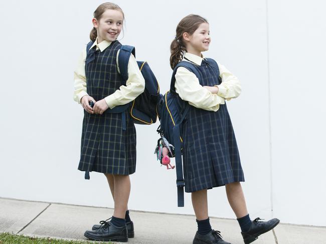 Lilly and Ruby Zanet were happy to get back to school to see their friends. Picture: Tim Pascoe