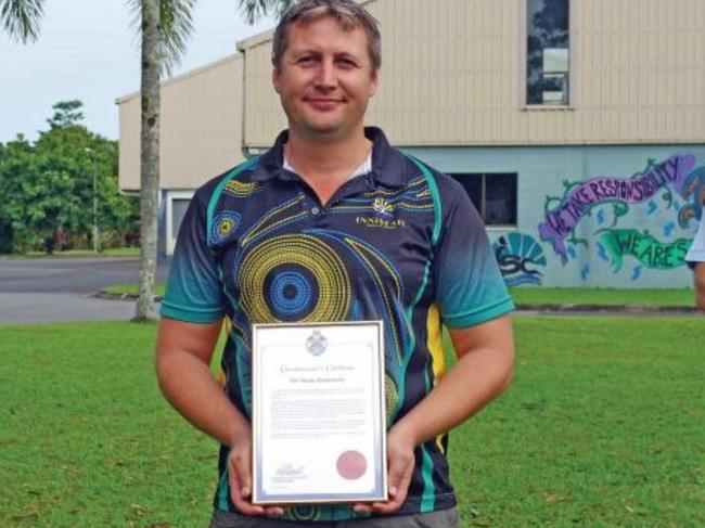 Innisfail State College teacher Shane Radanovic with Chief Superintendent Brian Huxley in 2020 when Mr Radanovic was awarded a Group Bravery Citation. Picture: Wet Tropics Times